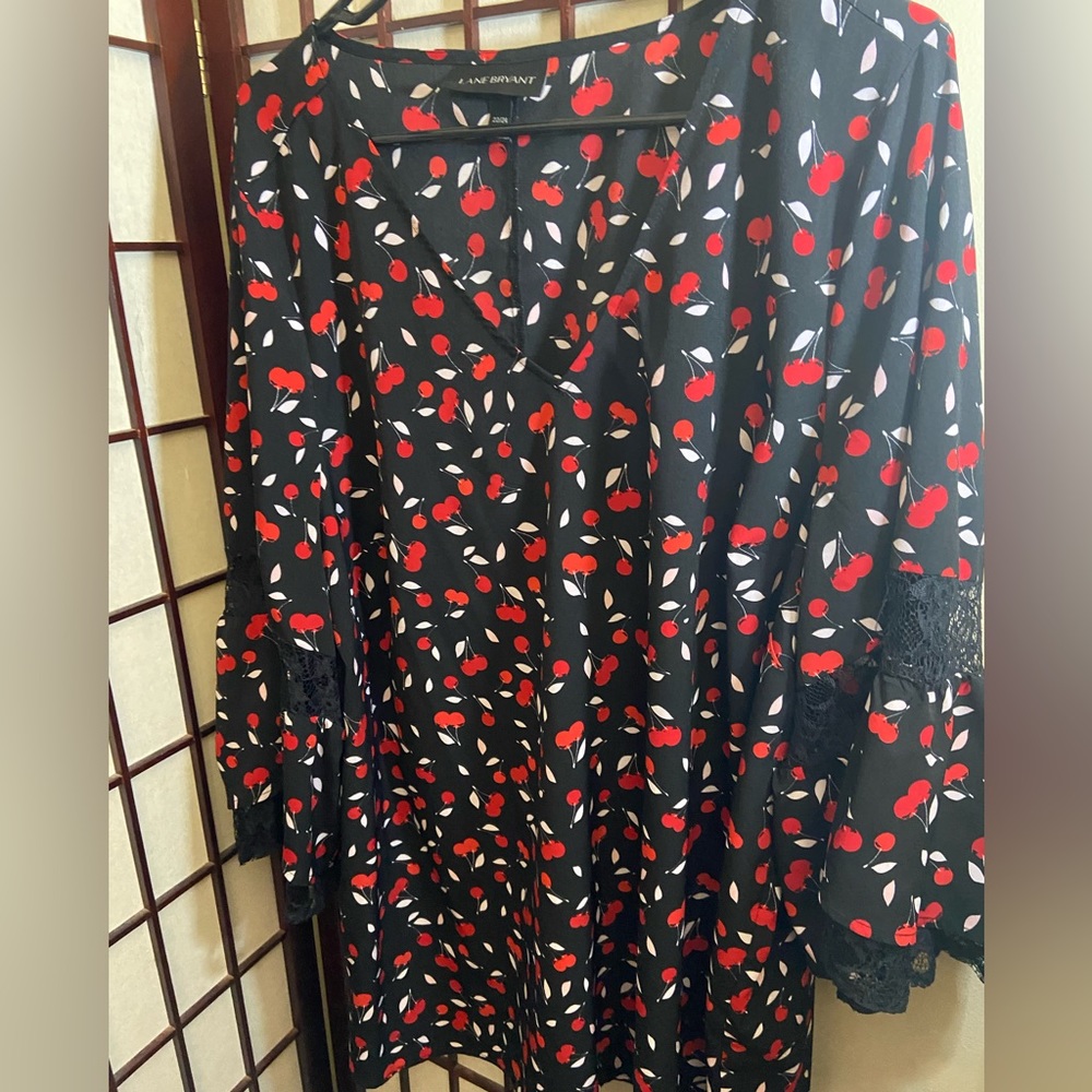 Lane Bryant black with cherry motif lace bell sleeve blouse with two lace panels